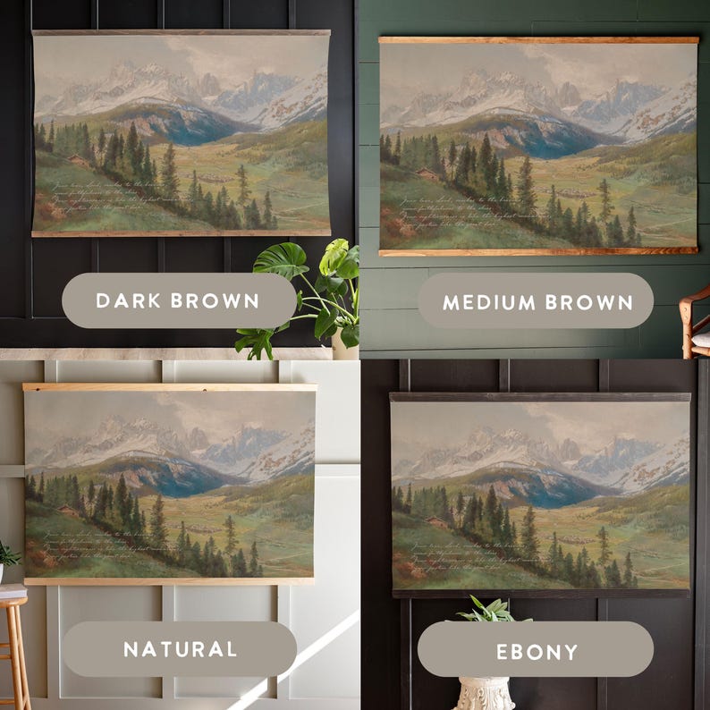May include: A landscape print featuring a mountain range, trees, and a valley, available in four frame colors: dark brown, medium brown, natural, and ebony. The artwork is displayed on a wall, showcasing the different frame options.