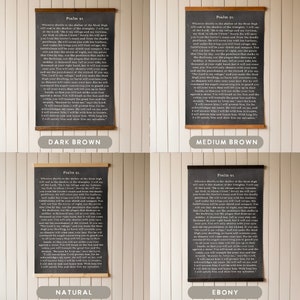 May include: Four different versions of a Psalm 91 wall hanging. The wall hanging is printed on a canvas with a wood frame. The canvas is available in dark brown, medium brown, natural, and ebony. The text on the canvas is white and reads "Psalm 91" and the text of the psalm.