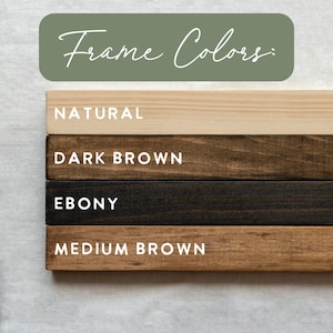 May include: Four wood frame samples in different colors: natural, dark brown, ebony, and medium brown. The text "Frame Colors" is written in white on a green background above the samples.