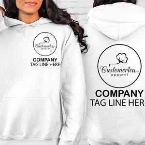 a woman wearing a white hoodie with the company tag line here on it
