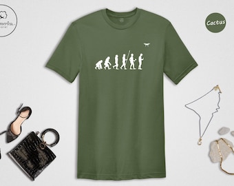 Camiseta de drones con temática de evolución humana, Camiseta de evolución, Evolución humana, Evolución del hombre, Camiseta de los primeros humanos, Camiseta sarcástica sobre drones, Camiseta de piloto de drones