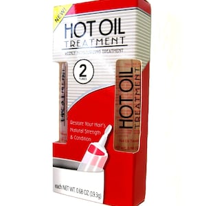 May include: A red and white box containing two tubes of Hot Oil Treatment for hair. The box says "Weekly Moisturizing Treatment" and "2 Tubes". Each tube contains 0.68 ounces (19.3 grams) of product.