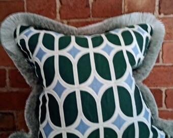 Geometric pattern cushion cover Romo Linara reverse Houles fringe detail
