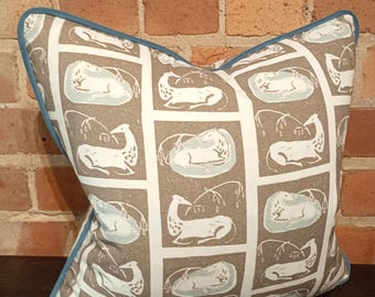 Cushion cover made using , Nicholas Herbert , Fawns fabric with blue alcantara piping
