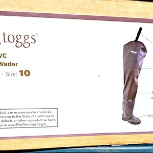 May include: Brown Frogg Toggs Rana PVC Lug Sole Hip Wader, size 10. Features include adjustable web belt leashes with quick-release buckles, PVC with polyester uppers, and 2mm non-insulated PVC boot. Made in China.