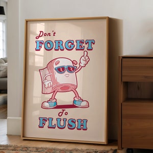 May include: A humorous poster with a cartoon toilet paper roll wearing sunglasses and saying "Don't forget to flush".