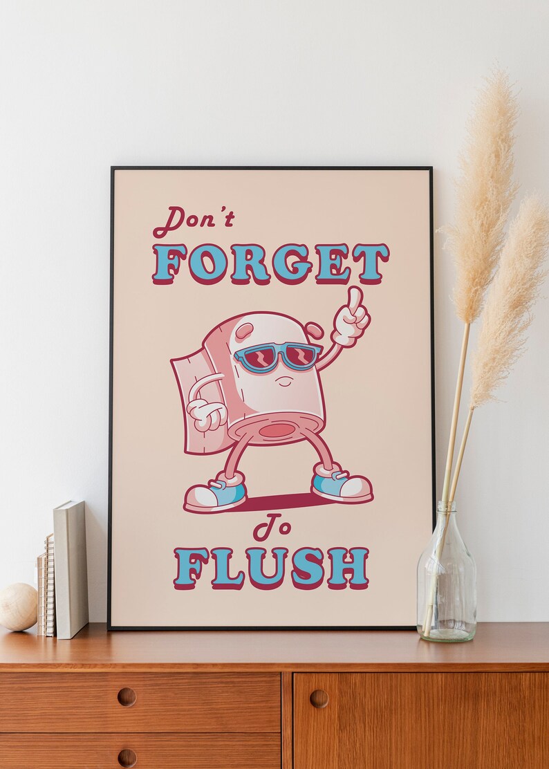 May include: A humorous poster with a cartoon toilet paper roll wearing sunglasses and saying "Don't forget to flush".