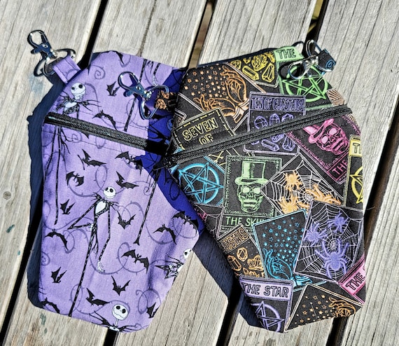 Hook on coffin pouch. Skull, cat, bats, jack, weed, tarot, fangs, child.