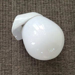 Wilhelm Wagenfeld vintage bathroom/kitchen lamp model 6011.   White porcelain base with opaline glass bulb.