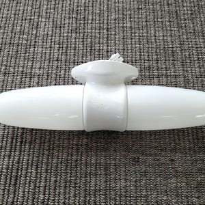 Rare white vintage mirror lamp 6066 by Wilhem Wagenfeld for Lindner Germany. Designed in 1955.