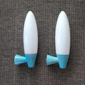 Rare space age vintage bathroom sconces, designed by Gunnar Nylund for Ifö in 1960&#39;s Model 6005. 2 sconces, turqoise , excellent condition.