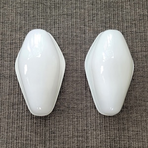A pair of white vintage Space Age lamps, sconces, model 6102 by Wilhem Wagenfeld for Lindner Germany.