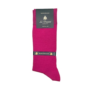 May include: A pair of magenta socks with a black label that reads "Mercerized" and a gold label that reads "La' Pescara Socks Ultra Lux".