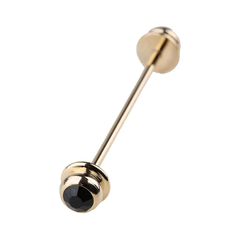 May include: A gold-toned barbell body jewelry piece featuring a straight post with a flat circular backing and a front-facing end cap set with a single, round, faceted black gemstone. The metal has a polished, reflective finish throughout.