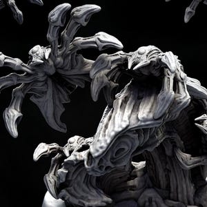 May include: Technocron H.R. Giger Tribute sculptures. The image shows several gray, detailed sculptures of a biomechanical creature with clawed hands and a textured, organic appearance. The sculptures are on circular bases, with the Technocron and H.R. Giger Tribute text at the top.