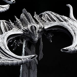 May include: A collection of gray, biomorphic sculptures, reminiscent of skeletal structures and organic forms. The sculptures are displayed against a dark background, with the text "TECHNOCRON II H.R. GIGER TRIBUTE" at the top. The designs are intricate and detailed.