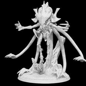 May include: A white unpainted miniature figurine of a multi-limbed creature with a large armored head, sharp claws, and long tentacles extending from its body. The creature stands on a circular base with rocky terrain details and textured ground.