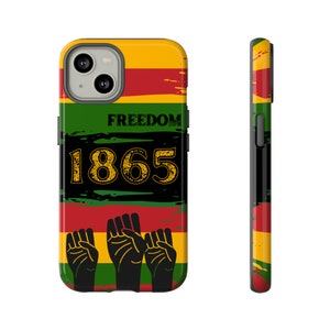 May include: A black phone case with a red, yellow, and green striped design. The case features the text "FREEDOM 1865" and three raised black fists.
