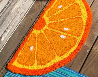 Handmade orange fruit half circle rug