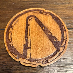 Stained basswood weathered Vault logo from the Borderlands video games with semi gloss finish