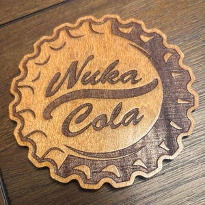 Stained basswood Nuka Cola bottle cap from Fallout with semi gloss finish