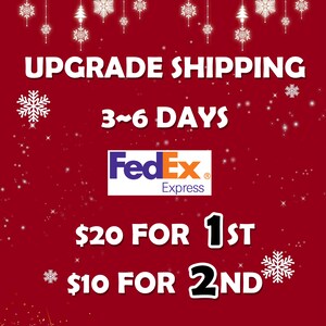 May include: A festive red graphic with white text that reads "UPGRADE SHIPPING" and "3~6 DAYS". The FedEx Express logo is centered. Additional text includes "$20 FOR 1ST" and "$10 FOR 2ND". Snowflakes and stars decorate the background.