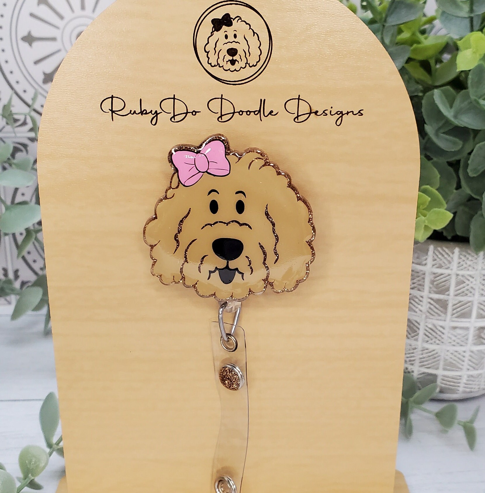 Tan Rubydo Shaped Doodle Girl With Bow Badge Reel Goldendoodle