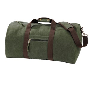 May include: A green canvas duffel bag with brown leather straps and a zippered pocket. The bag has a top handle and a shoulder strap.