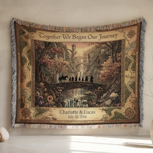 May include: Woven tapestry with a fantasy landscape scene. The artwork depicts a bridge over a waterfall, with figures walking across it. The text "Together We Began Our Journey" is at the top. Personalized with names and a date.
