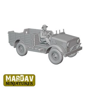 May include: A gray scale model of a military truck with a driver figure. The truck has a flatbed, large tires, and a detailed engine compartment. The driver is wearing a helmet and uniform. The logo "MARDAV MINIATURES" is at the bottom.