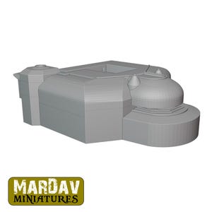 May include: A gray miniature model of a bunker with a rectangular main structure and rounded turret-like features. The model has a textured surface and is labeled "MARDAV MINIATURES" in a green and yellow rectangle.