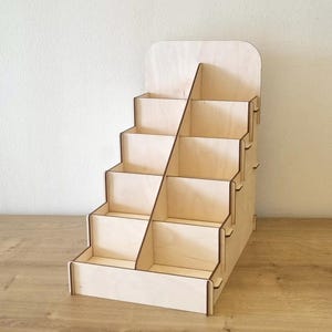 Houten display "Gisa Quint"