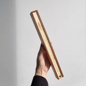 Wooden brush box with sliding lid