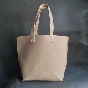 Natural un-dyed vegetable tanned leather tote bag hand stitched