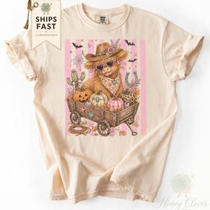 かわいいハイランド牛のハロウィンTシャツ、風変わりな秋のパンプキンワゴンウエスタン風の不気味な牛好きへのギフト、彼女への秋のTシャツ