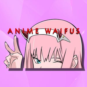 May include: Anime-style illustration of a character with pink hair, blue eyes, and a white and red headband. The character is winking and making a peace sign with their hand. The text "ANIME WAIFUS" is in red above the character.