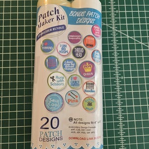 May include: A Patch Maker Kit stabilizer bundle featuring 20 patch designs with various sewing-themed phrases and graphics. The packaging includes a note that all designs fit 4 inches by 4 inches and lists compatible embroidery design file formats.