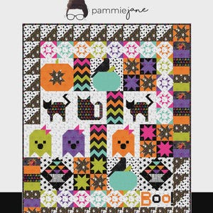 May include: A colorful Halloween-themed quilt pattern with pumpkins, cats, and the word "Boo!" The quilt measures 60 x 72 inches and features a variety of patterned blocks in orange, black, purple, and green. The text "Spooky Sampler" is at the top.