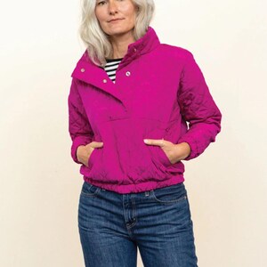 May include: A magenta quilted pullover with a high collar and a front pocket. The image includes text that reads "#038 Intermediate For knit or woven fabrics Sizes XS - 7X" and "The Pogonip Pullover". The brand name "FRIDAY pattern co." is also visible.