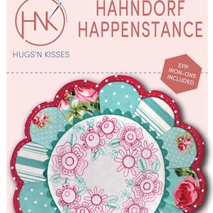 May include: A floral-themed craft project with the text "HAHNDORF HAPPENSTANCE" and "HUGS'N KISSES". The design features a flower shape with a red scalloped edge, teal and floral patterned fabric, and a central embroidered floral design. Includes EPP iron-ons.