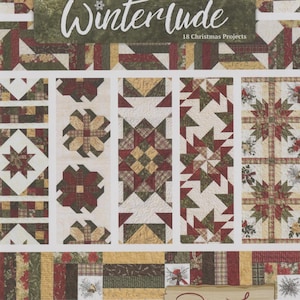 May include: A quilt pattern book titled "Winterlude" with 18 Christmas projects. The cover features a green banner with white text and snowflake. The quilt blocks are in shades of red, green, and beige.