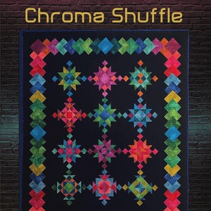 May include: A colorful quilt with a black background, featuring geometric star and diamond patterns in shades of red, blue, green, and pink. The quilt measures 78 x 94 inches and is titled "Chroma Shuffle."
