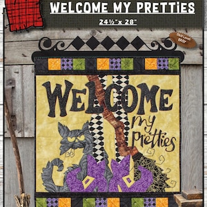 May include: A Halloween-themed wall hanging with the text "WELCOME MY PRETTIES". The design features a black cat, a witch's broom, and a checkerboard pattern. The dimensions are 24.5 inches by 28 inches.