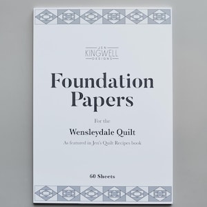 May include: A white booklet titled "Foundation Papers" for the Wensleydale Quilt, featuring the Jen Kingwell Designs logo. The cover includes decorative geometric patterns and text indicating 60 sheets.