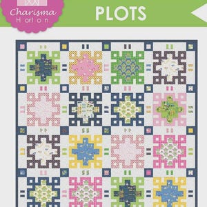 May include: A colorful quilt with a repeating block pattern in shades of pink, green, blue, and yellow. The quilt measures 82 inches by 102 inches. The text "PLOTS" is displayed on the quilt. The quilt is part of "THE LITTLE PINK BARN SERIES".