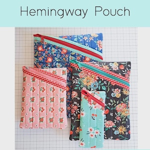 May include: Four quilted zipper pouches in various floral patterns, including blue, pink, and black, with diagonal zippers. The text "Hemingway Pouch" is at the top, and "Quilted Zipper Pouch Pattern in Four Sizes" is on the right.
