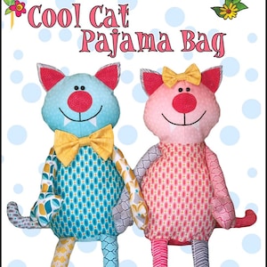 May include: Two stuffed cat-shaped pajama bags. One is light blue with a yellow bow tie, the other is pink with a yellow bow. The text "Cool Cat Pajama Bag" is at the top. The bags have patterned fabric.