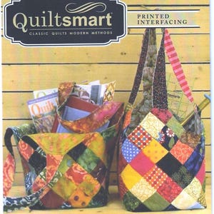 May include: A colorful patchwork Midi Bag, with the text "Quiltsmart" and "Printed Interfacing". The bag is filled with quilting supplies. The bag has a simple technique and squares on fusible interfacing sew up fast.