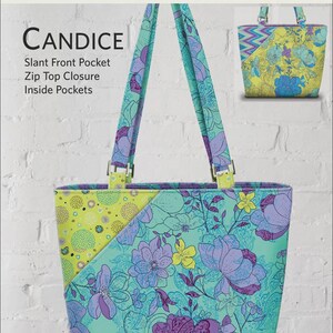 May include: A floral tote bag with a teal, purple, and yellow design. The bag features a slant front pocket, zip top closure, and inside pockets. The bag measures 11" x 11 1/2" x 4 1/2". The bag is labeled "CANDICE" by Lazy Girl Designs.