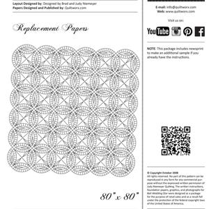 May include: A black and white quilt pattern titled "Bali Wedding Star" with the dimensions 80" x 80". The design features repeating circular and star-like shapes. The package includes newsprint for an additional sample.